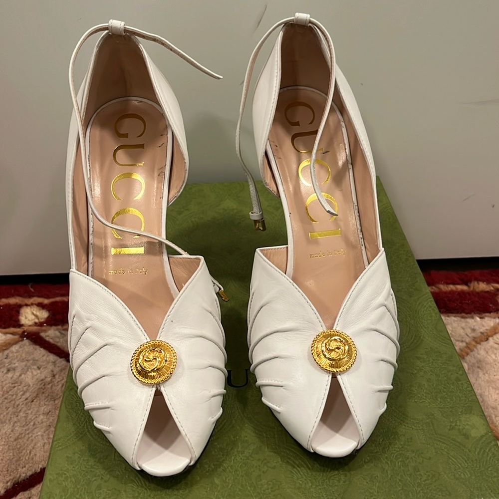Authentic Gucci Great White Pump with strap around ankle.